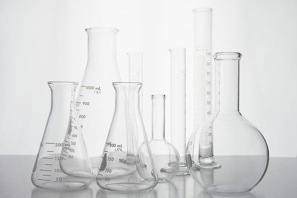 laboratory glass tube on the surface HD wallpaper